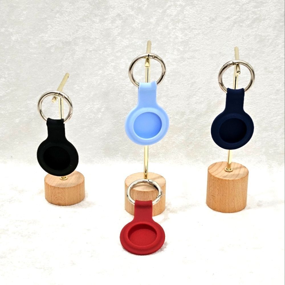 Set of air tag holders in 4 colors.